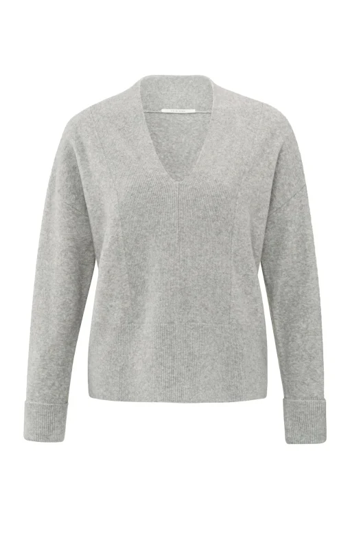 Soft sweater with deep V-neck and subtle rib details